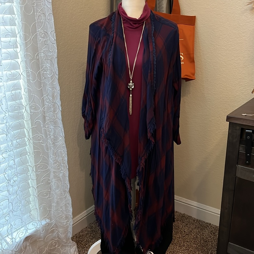 Ladies burgundy/navy wrap. Cute piece. 27” in back. 44” on side. Fringe detail